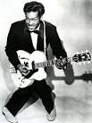 This is a picture of Chuck Berry playing guitar.